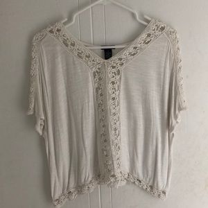 This top has beautiful lace down the front!